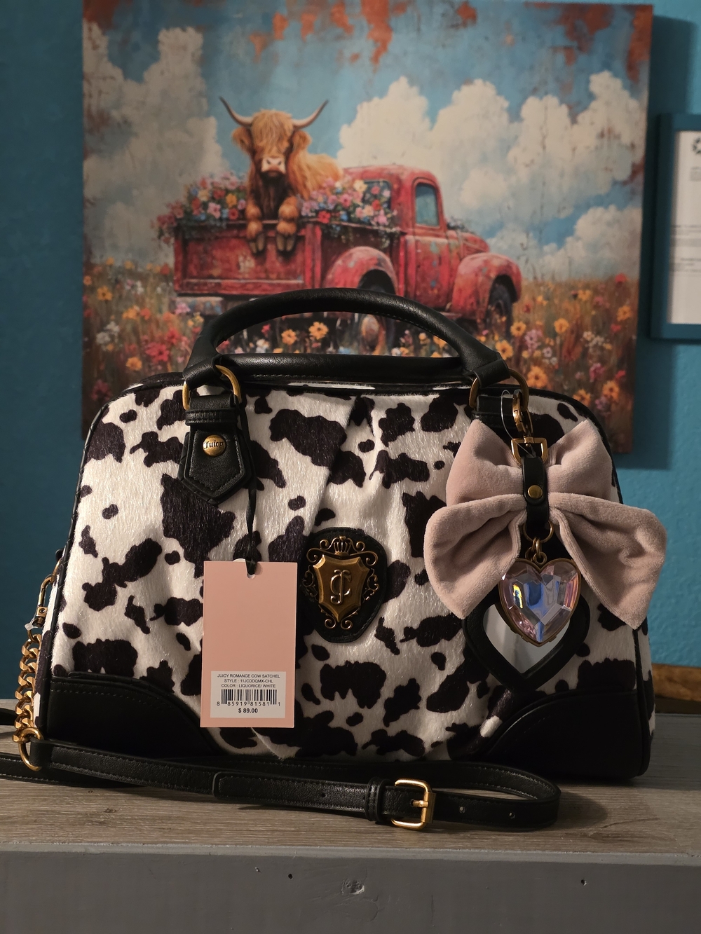 Juicy Couture Black & White Cow Print Satchel with Pink Bow Charm